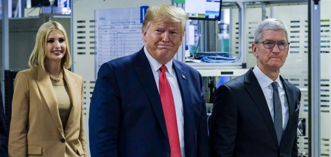 Tim Cook with an apple