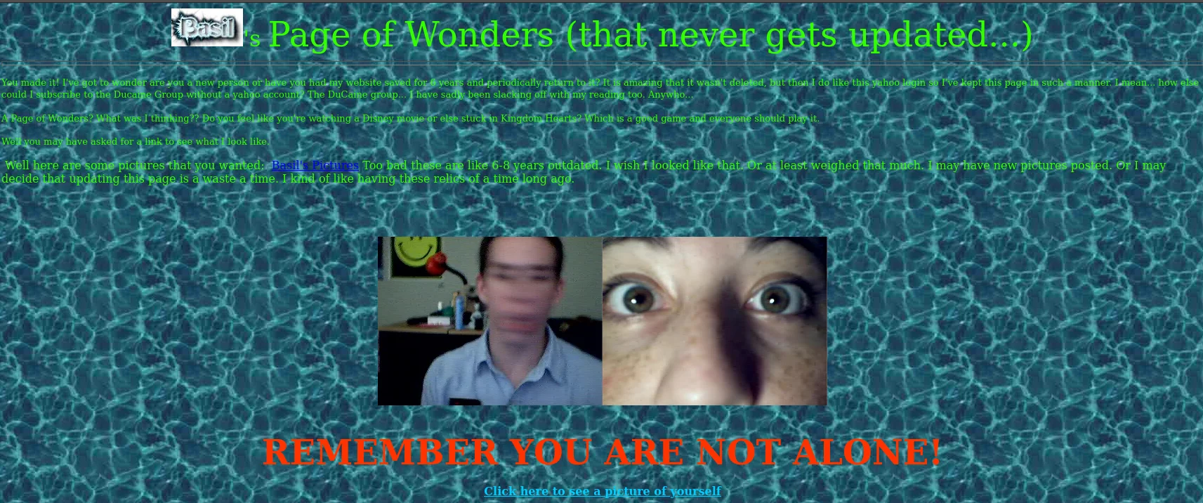 a screenshot from an old geocities page with a wavy water background, a photo of a boy who had his picture taken when he was moving his head really fast, causing it to blur, and a close-up of a girl's eyes. There is hardly legible text above these photos, but the largest, red text reads, remember you are not alone.