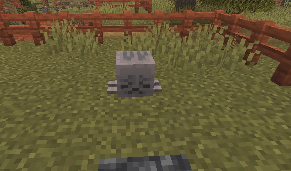 A small, mysterious hut lit with redstone torches.