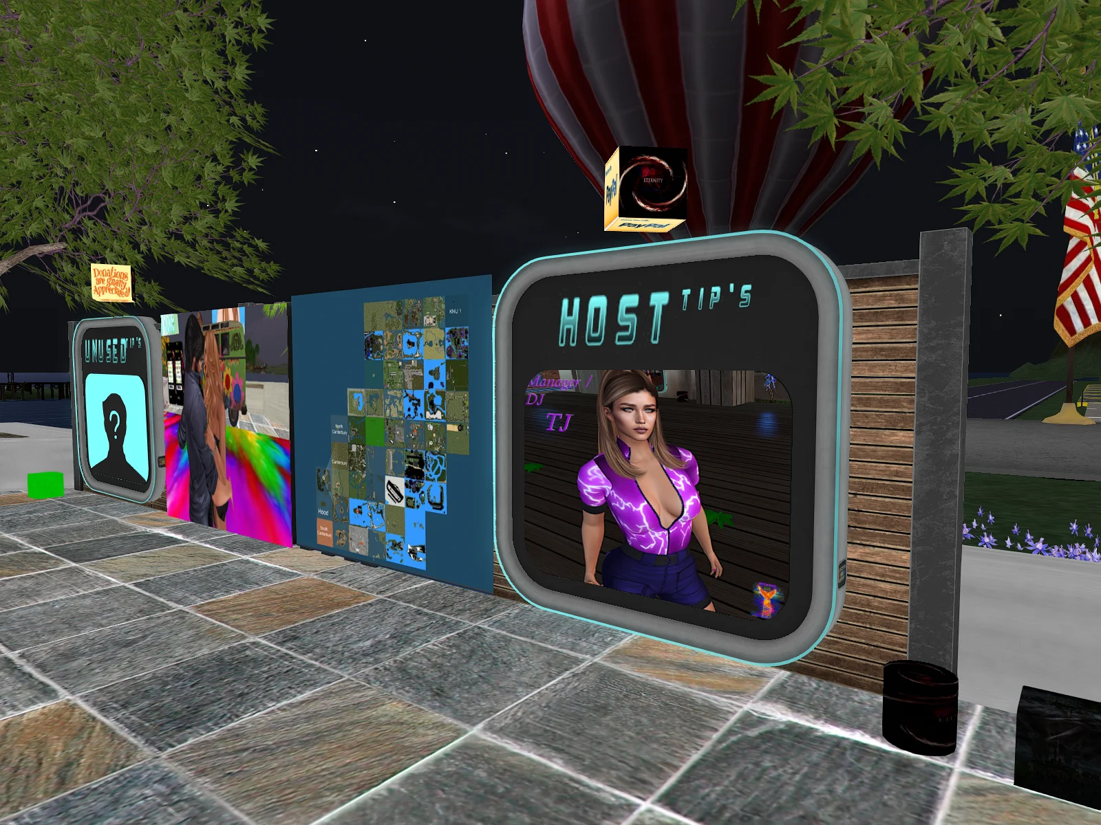 Nightclub with people dancing and lights.